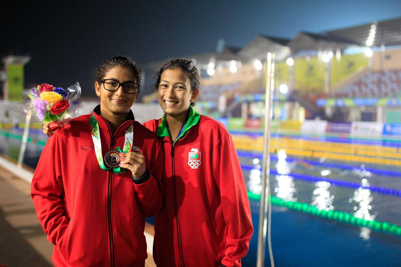 Sajan alongside her sister Sajina, celebrates a historic win for Maldives at the 12th South Asian Games in India.