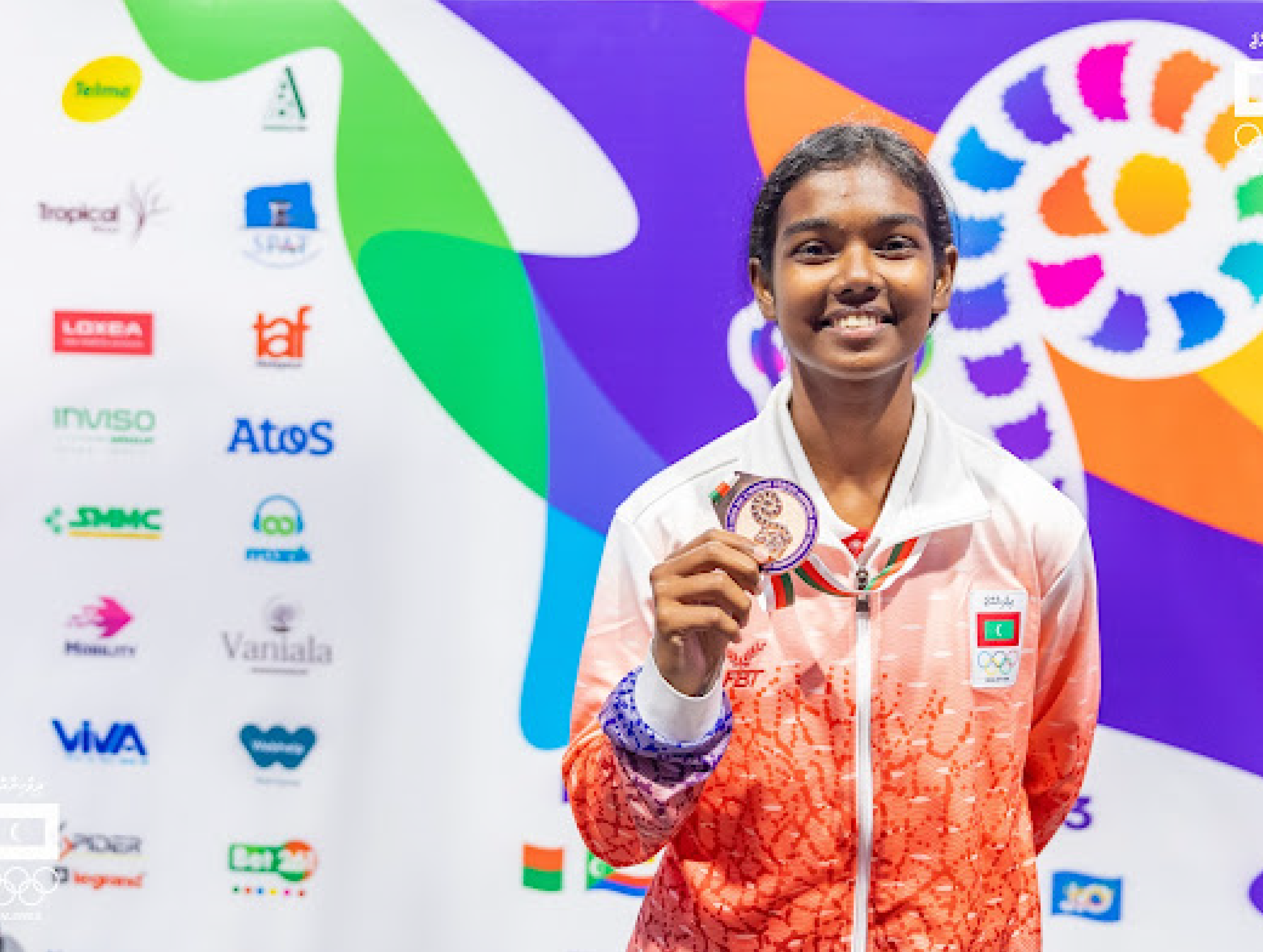 Ifa smiles for the camera as she poses with the bronze medal at the 2023 Indian Ocean Island Games © Mohamed Shabin via Ifa