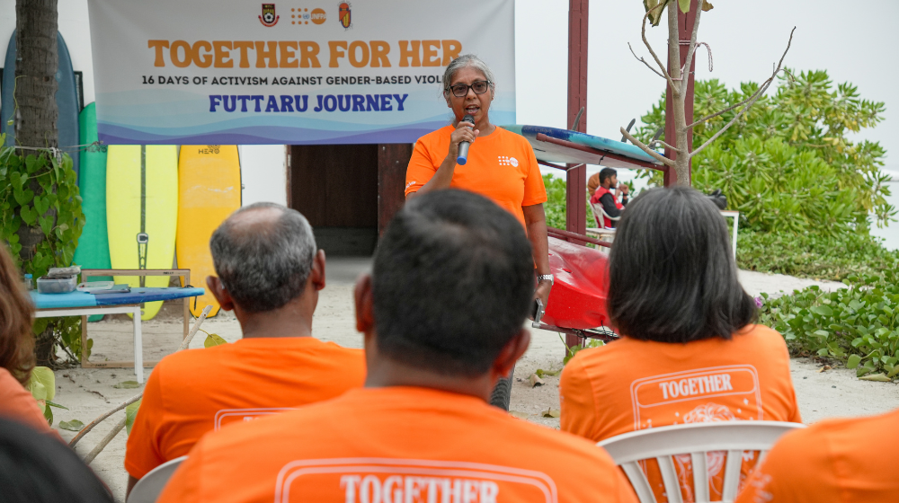 Shadiya Ibrahim, Head of Office of UNFPA Maldives speaking into the mic at the event.