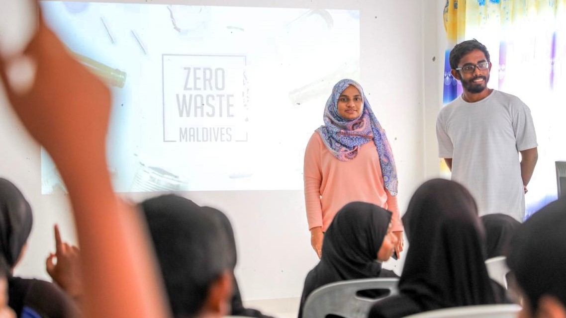 Zero Waste Maldives co-founders presenting in the middle of a session